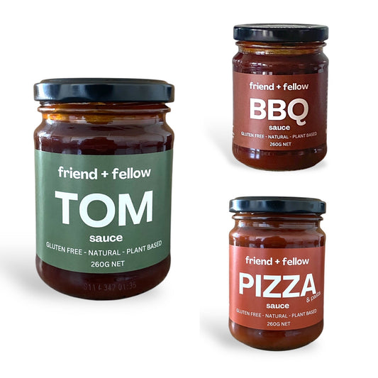 Three jars of 'friend + fellow' sauces on a white background