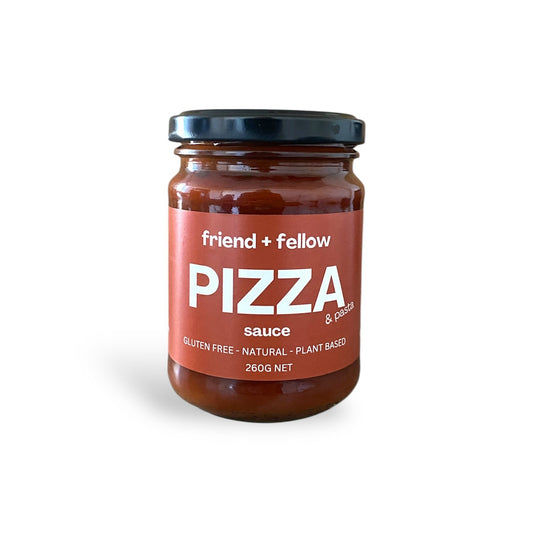 Jar of pizza sauce with 'friend + fellow' label on a white background